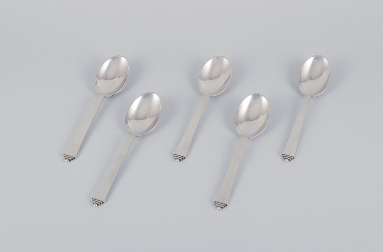 Georg Jensen, set of five Pyramid dessert spoons in sterling silver.