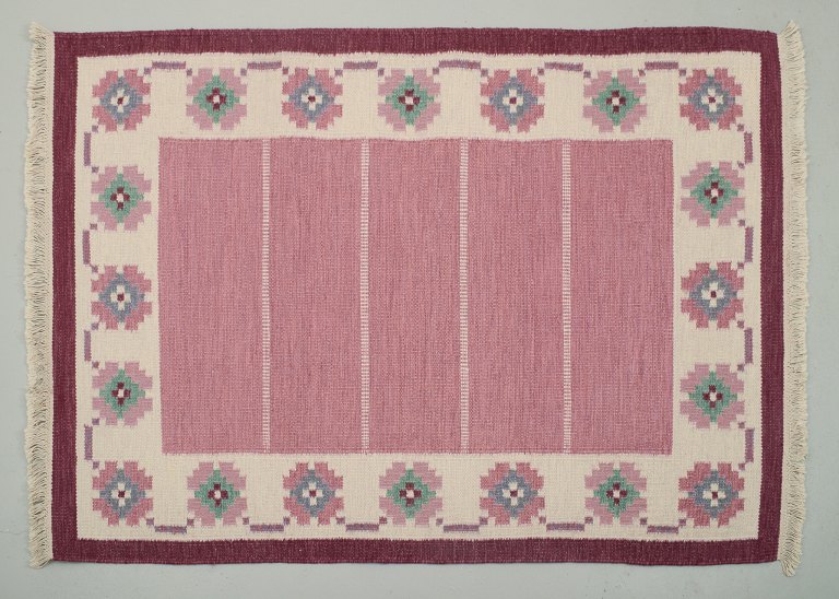 Swedish handwoven carpet in pure wool. Rölakan technique. Geometric pattern in blue, green, white, violet, and pink colors.