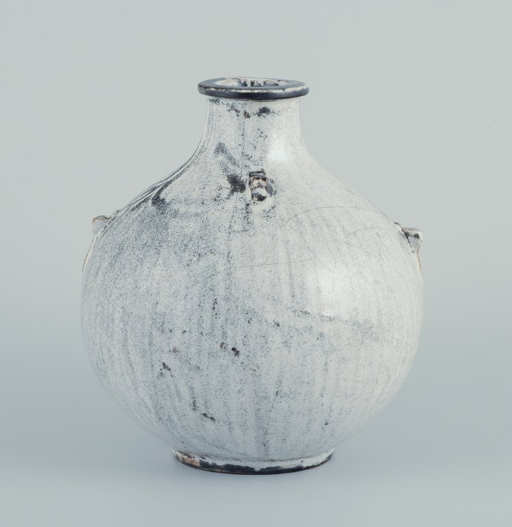 Svend Hammershøi for Kähler. Ceramic vase with narrow neck in black-gray double 
glaze.