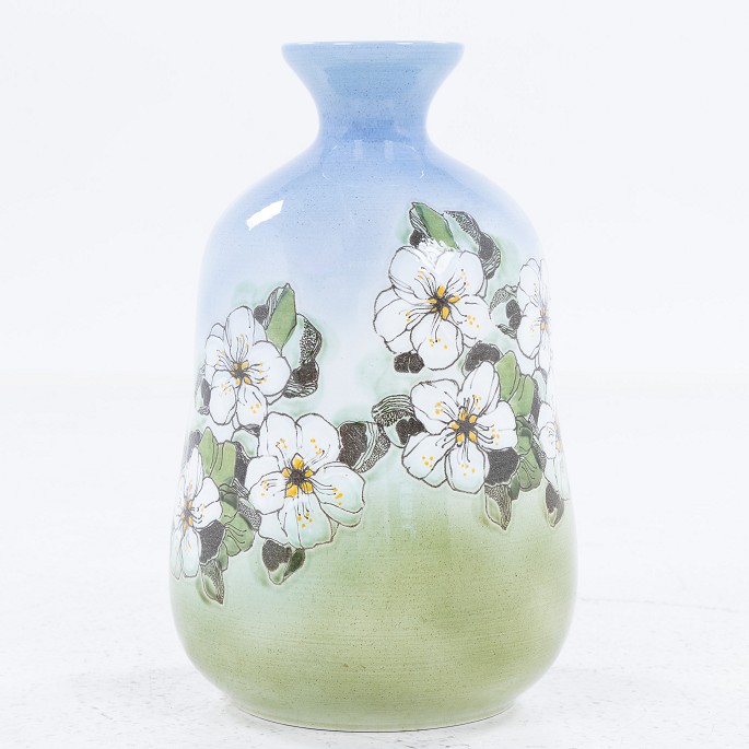 Royal Copenhagen
Vase in faience with floral motif.
1 pc. in stock
Good, used condition
