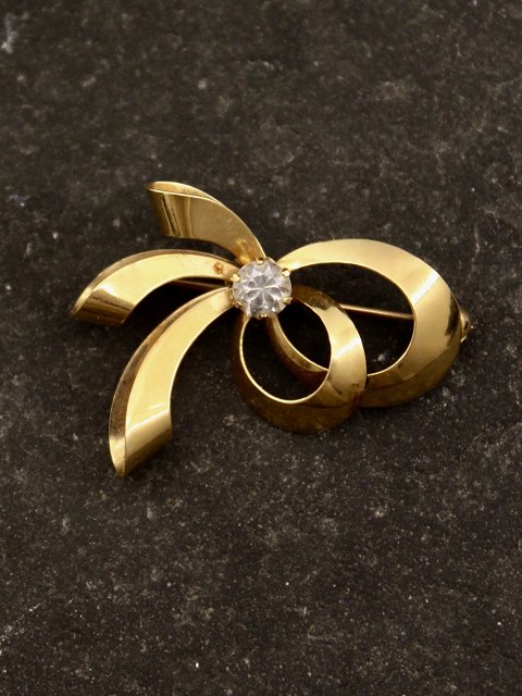 14 carat gold brooch with zircon