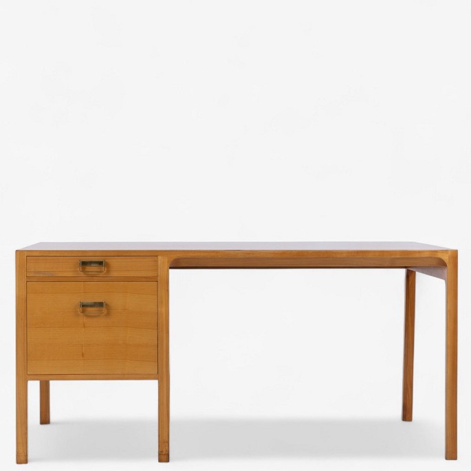 Bernt Petersen / Rud. Rasmussen Joinery.Desk in elm with two drawers.1 pc. in stock